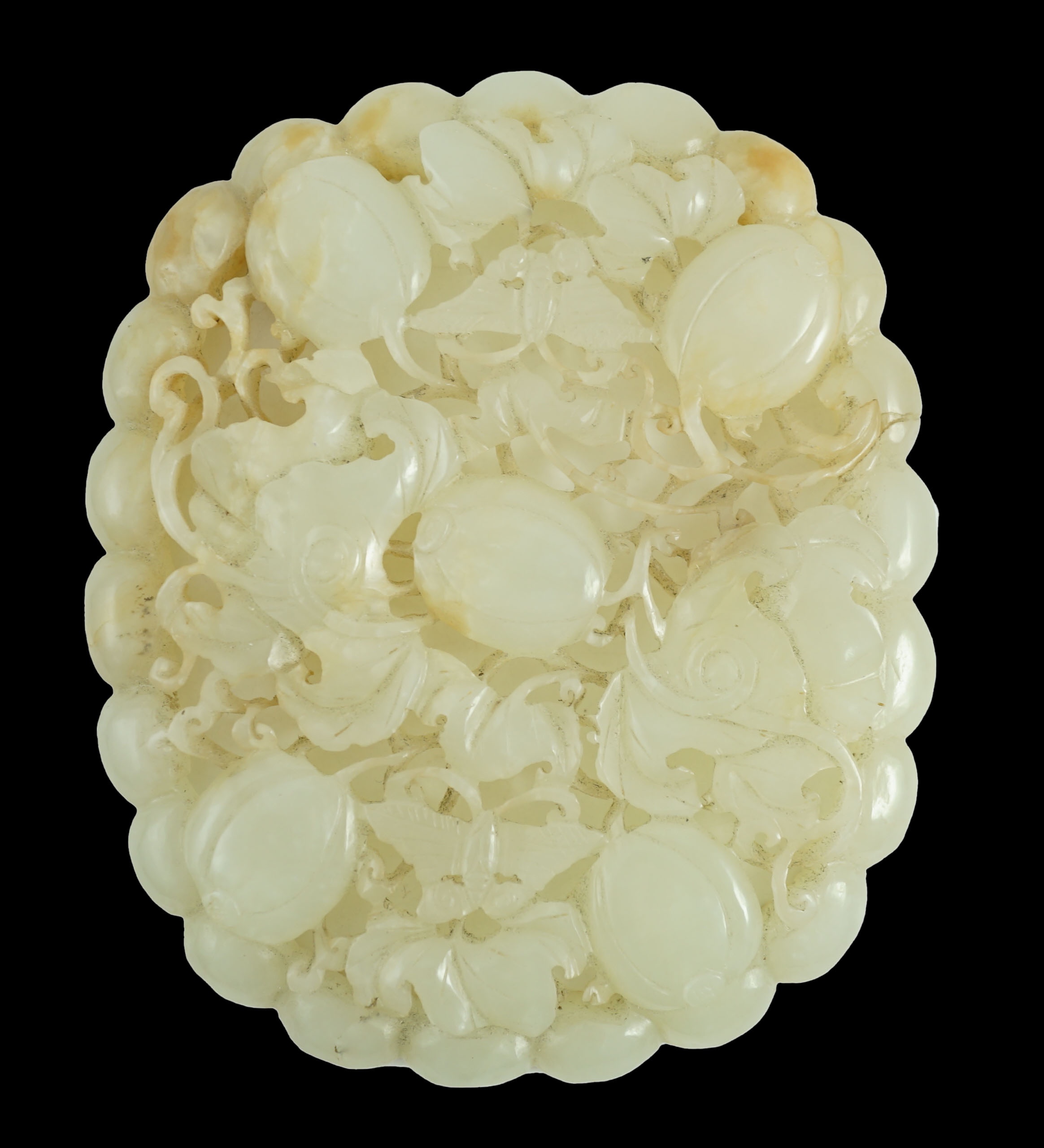 A Chinese pale celadon jade oval openwork plaque, 19th century, 9.8 cm x 8.2 cm